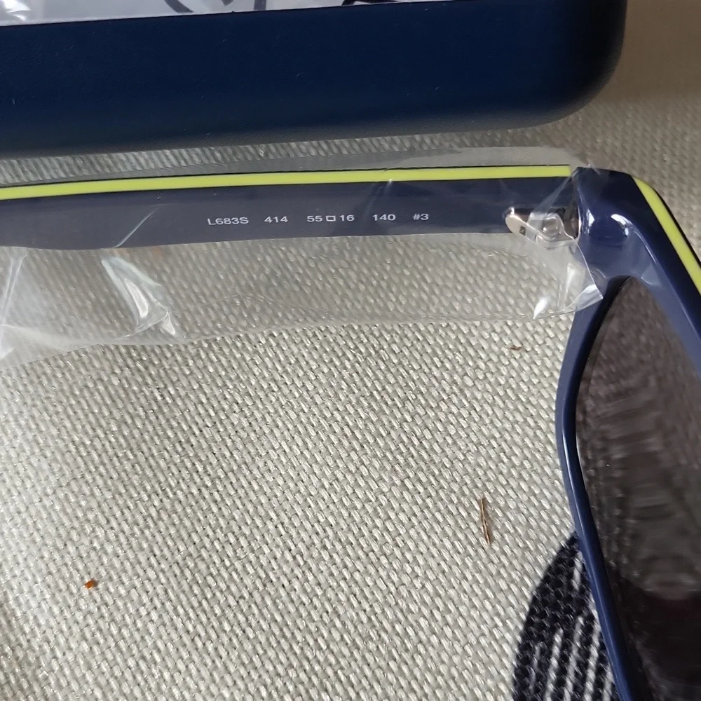 Lacoste gorgeous sunglasses dark blue yellow bagged tagged Unisex